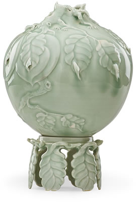 Cliff Lee : Fine carved celadon vase with peaches on branch on stand, Stevens, PA, 1992