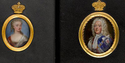 Christian Friedrich Zincke : A pair of portraits: George II (1683-1760) King of England (1727-1760), wearing robes of the Order of the Garter, blue cloak with white silk lining over crimson coat and tied white lace steinkirk, collar and badge of the Order of the Garter and full-botto