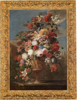 Nicola Casissa : A still life with flowers in an ornamental vase in a southern landscape